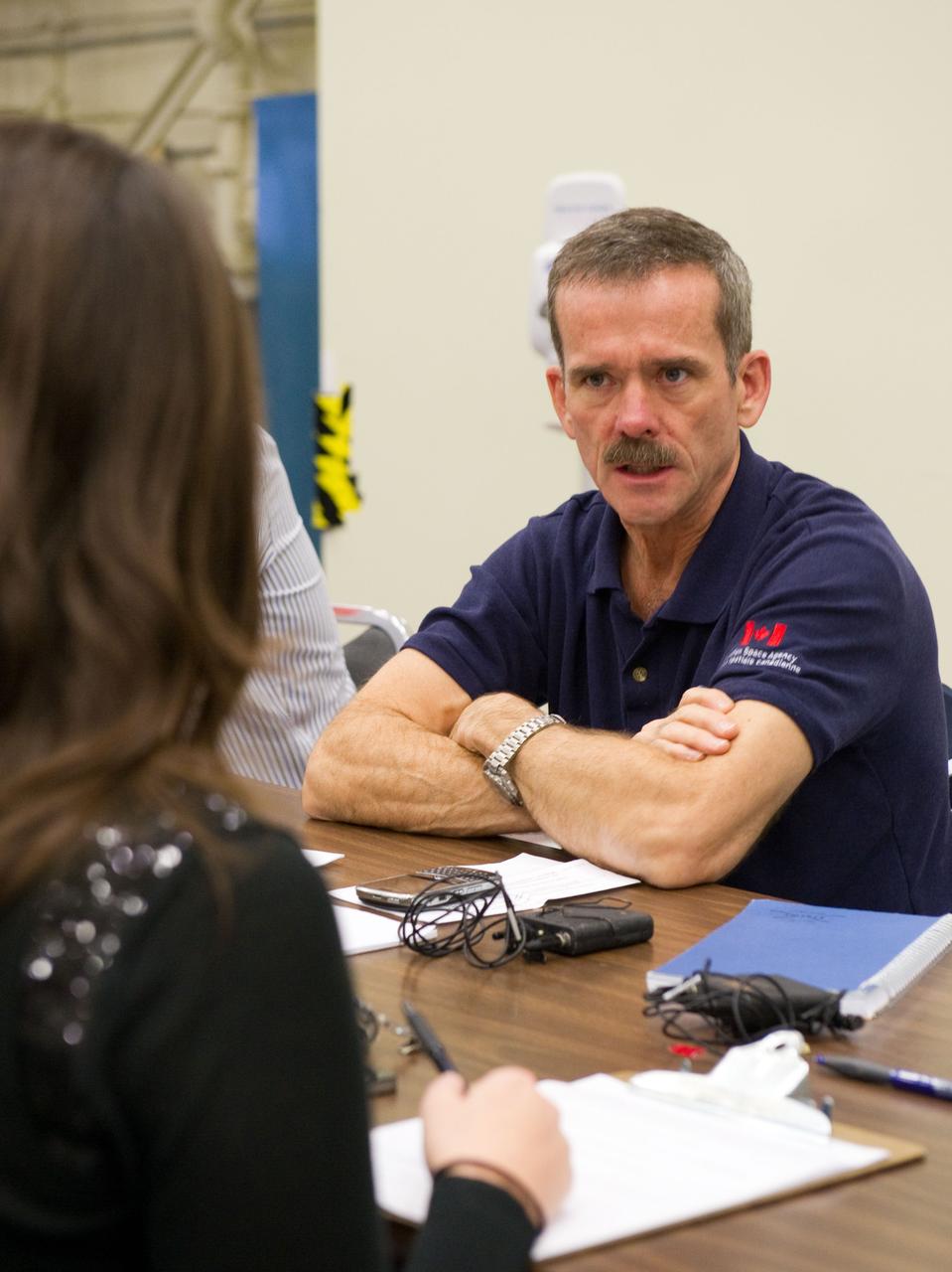 Date: 12-05-11 Location: Bldg 9NW, ISS Mockup Subject:  Expedition 33 Soyuz crew Tom Marshburn and Chris Hadfield during their Emergency Scene training Photographer: James Blair