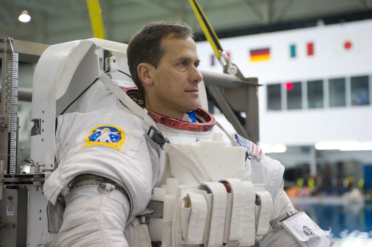 Expedition 34 astronaut crew members Chris Hadfield and Tom Marshburn during INC-34/CB ISS EVA 2 91027.  Photo Date: December 7, 2011.  Location: NBL - Pool Topside.  Photographer: Robert Markowitz