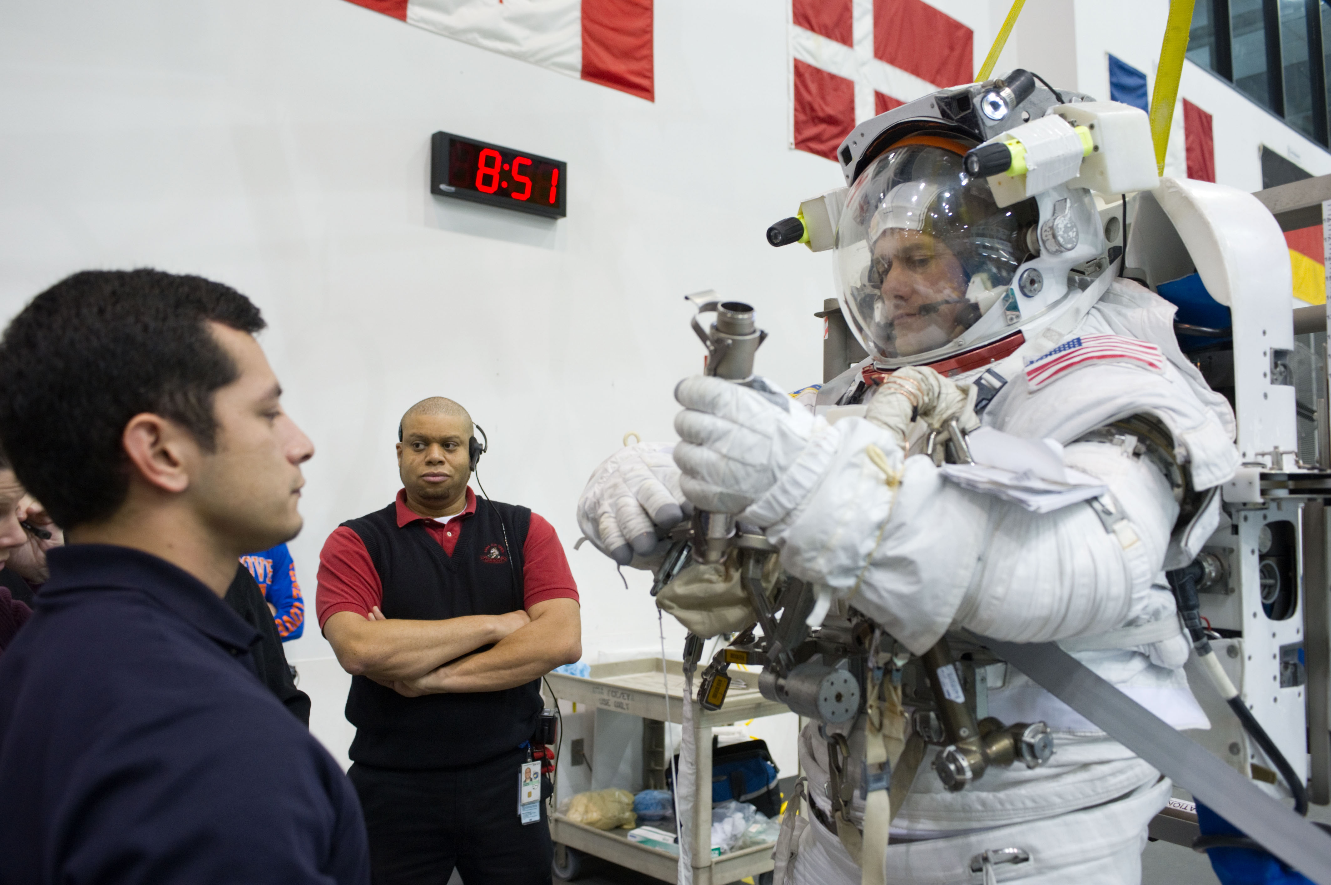 Expedition 34 astronaut crew members Chris Hadfield and Tom Marshburn during INC-34/CB ISS EVA 2 91027. Photo Date: December 7, 2011. Location: NBL - Pool Topside. Photographer: Robert Markowitz