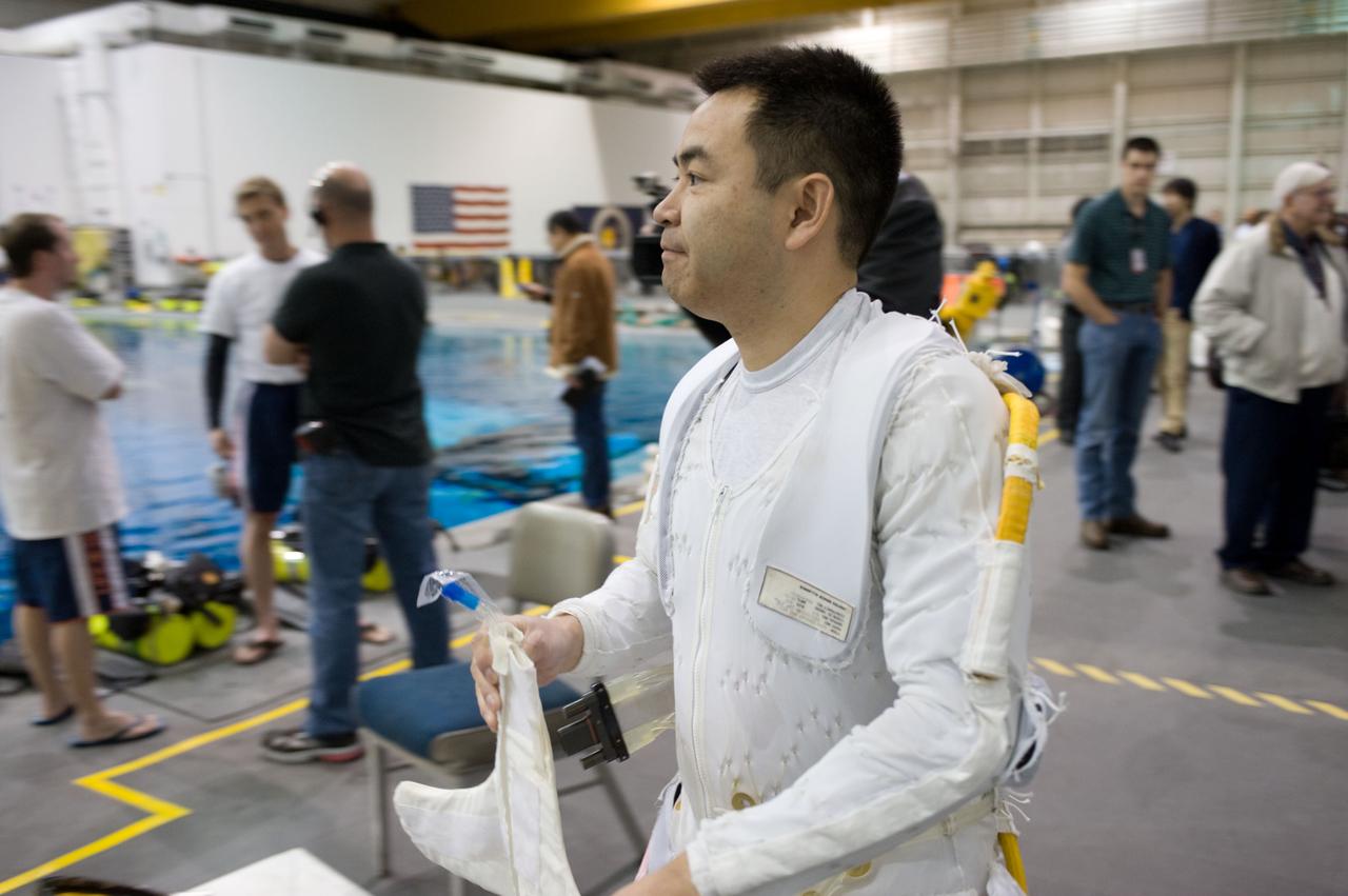 Expedition 33 crew members Sunita Williams and Aki Hoshide during NBL EVA training.  Photo Date: January 11, 2012.  Location: NBL - Pool Topside.  Photographer: Robert Markowitz