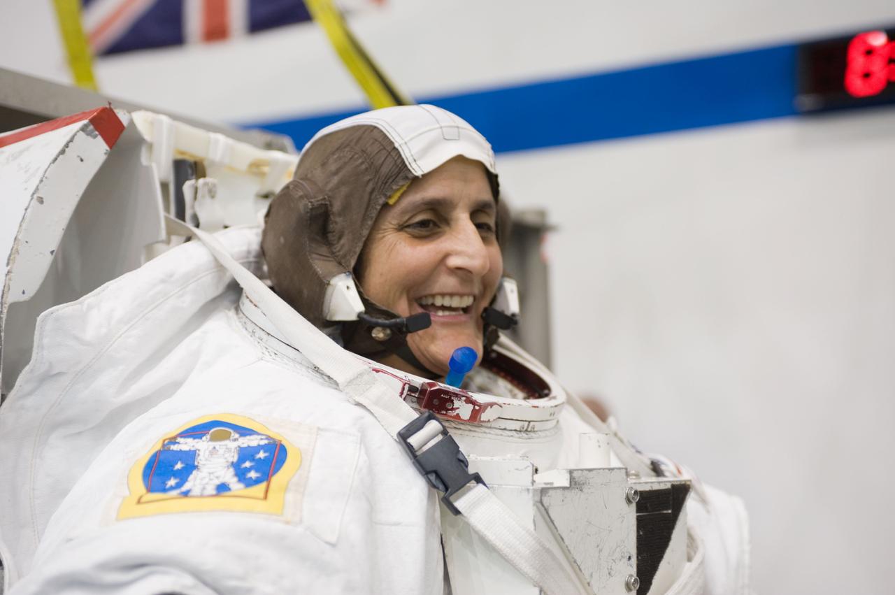 Expedition 33 crew members Sunita Williams and Aki Hoshide during NBL EVA training.  Photo Date: January 11, 2012.  Location: NBL - Pool Topside.  Photographer: Robert Markowitz