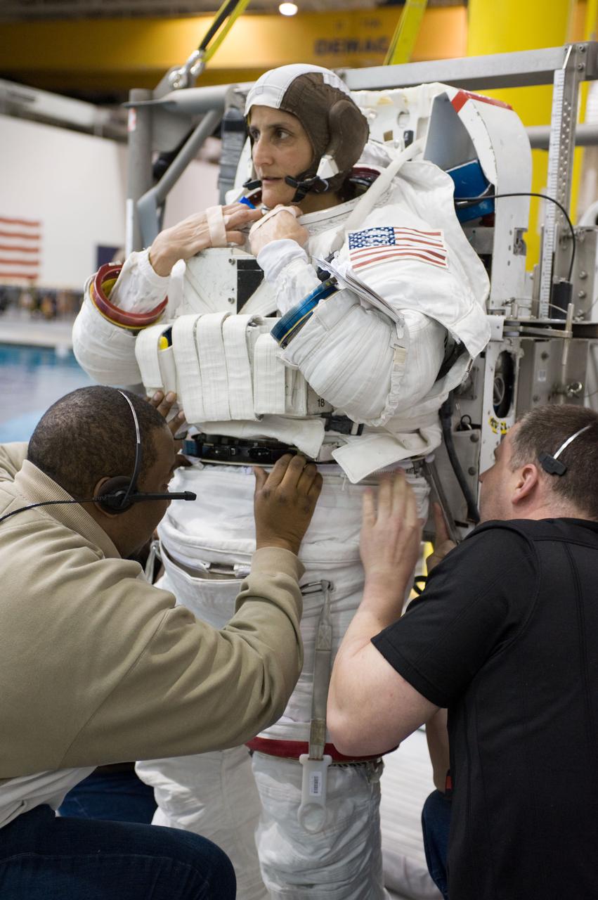 Expedition 33 crew members Sunita Williams and Aki Hoshide during NBL EVA training.  Photo Date: January 11, 2012.  Location: NBL - Pool Topside.  Photographer: Robert Markowitz