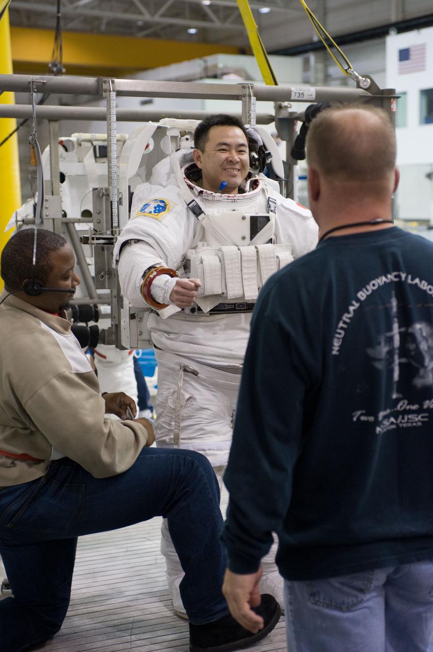 Expedition 33 crew members Sunita Williams and Aki Hoshide during NBL EVA training.  Photo Date: January 11, 2012.  Location: NBL - Pool Topside.  Photographer: Robert Markowitz