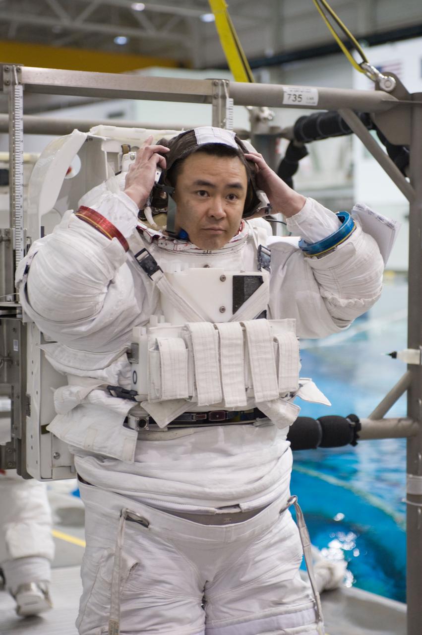 Expedition 33 crew members Sunita Williams and Aki Hoshide during NBL EVA training.  Photo Date: January 11, 2012.  Location: NBL - Pool Topside.  Photographer: Robert Markowitz