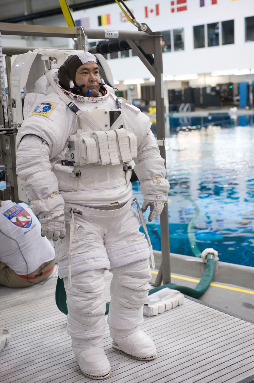 Expedition 33 crew members Sunita Williams and Aki Hoshide during NBL EVA training.  Photo Date: January 11, 2012.  Location: NBL - Pool Topside.  Photographer: Robert Markowitz