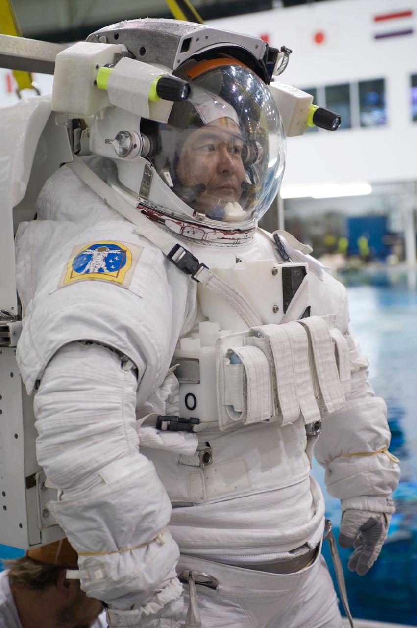 Expedition 33 crew members Sunita Williams and Aki Hoshide during NBL EVA training.  Photo Date: January 11, 2012.  Location: NBL - Pool Topside.  Photographer: Robert Markowitz