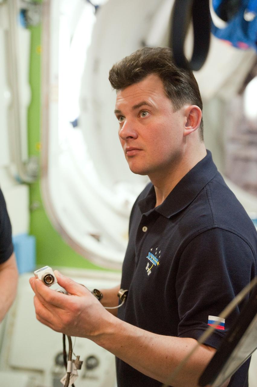 Soyuz 33 crew (33s) (Hadfield, Romanenko and Marshburn) during EVA Prep & Post training with Sandy Fletcher.  Photo Date: March 6, 2012.  Location: Building 9NW - ISS Mockups.  Photographer: Robert Markowitz