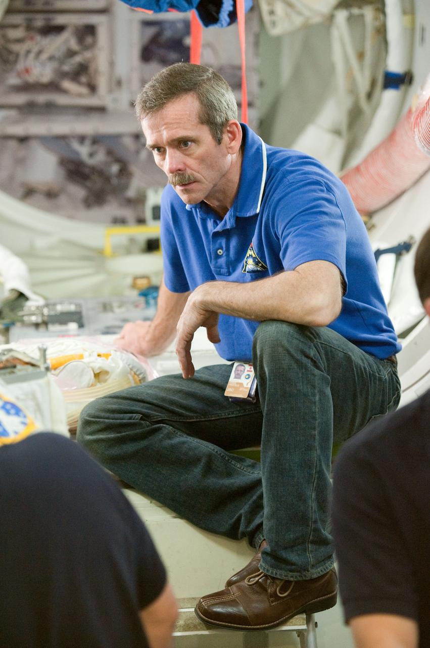 Soyuz 33 crew (33s) (Hadfield, Romanenko and Marshburn) during EVA Prep & Post training with Sandy Fletcher.  Photo Date: March 6, 2012.  Location: Building 9NW - ISS Mockups.  Photographer: Robert Markowitz