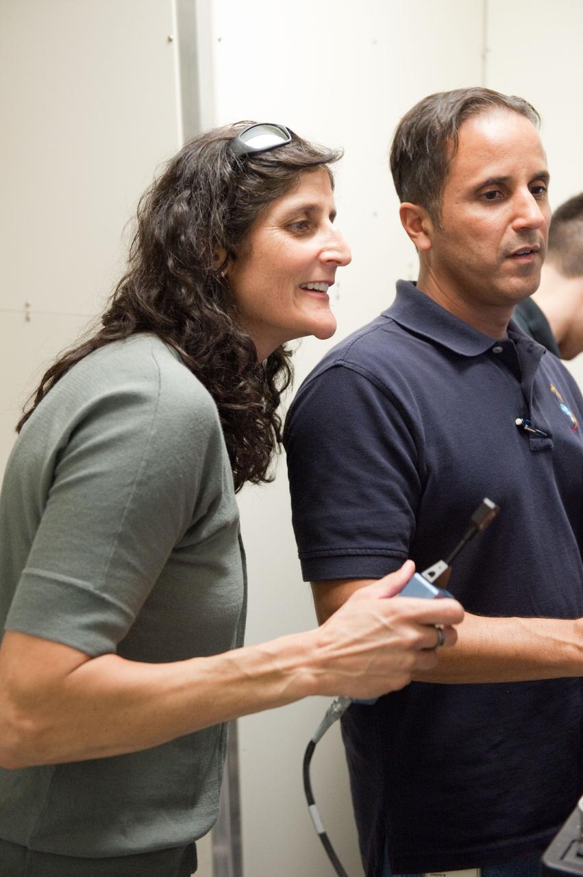 Date: 03-08-12 Location: Bldg 5, SSTF Subject: Expedition 32 (Soyuz 31) crew membesr Aki Hoshide, Sunita Williams and Joseph Acaba  during JAXA's HTV sim, FE Rendezvous/Deployment in building 5's space station training facility with Robo instructor Melanie Miller.  Photographer: James Blair