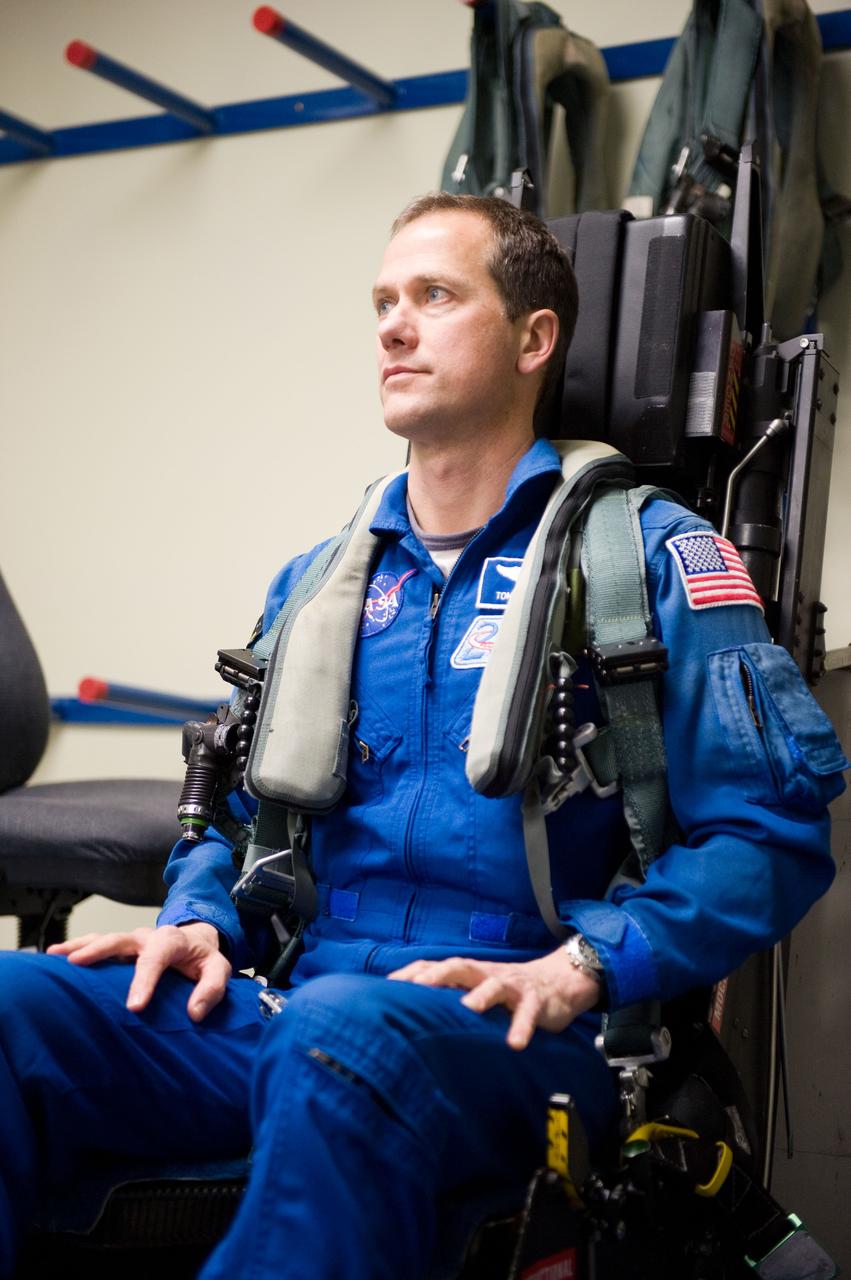 Date: 03-09-12 Location: Ellington Field Subject: Expedition 35 (Soyuz 33S) crew member Tom Marshburn preparing for his T-38 fligh with NASA pilot Thomas Parent. Photographer: James Blair