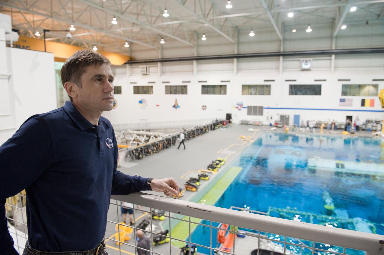 PHOTO DATE:  03/15/12 LOCATION:   NBL SUBJECT: Expedition 32 (Soyuz 31) crew members Aki Hoshide and Sunita Williams during EVA TL RUN at the NBL PHOTOGRAPHER:Geeseman