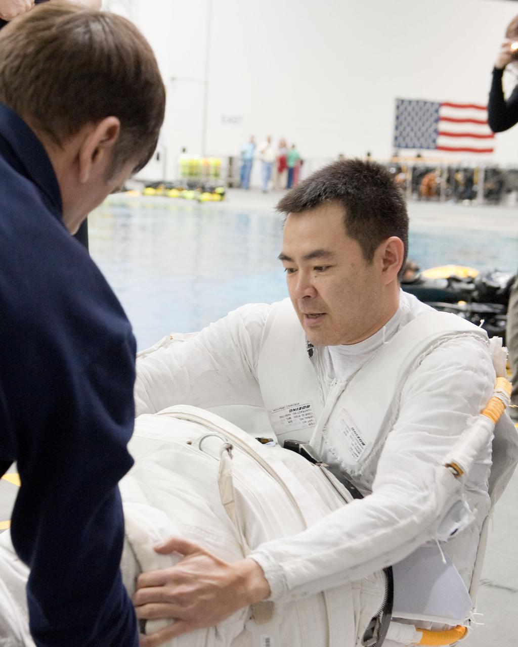 PHOTO DATE:  03/15/12 LOCATION:   NBL SUBJECT: Expedition 32 (Soyuz 31) crew members Aki Hoshide and Sunita Williams during EVA TL RUN at the NBL PHOTOGRAPHER:Geeseman