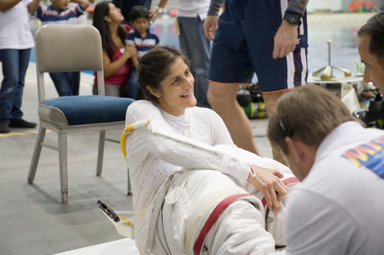 PHOTO DATE:  03/15/12 LOCATION:   NBL SUBJECT: Expedition 32 (Soyuz 31) crew members Aki Hoshide and Sunita Williams during EVA TL RUN at the NBL PHOTOGRAPHER:Geeseman