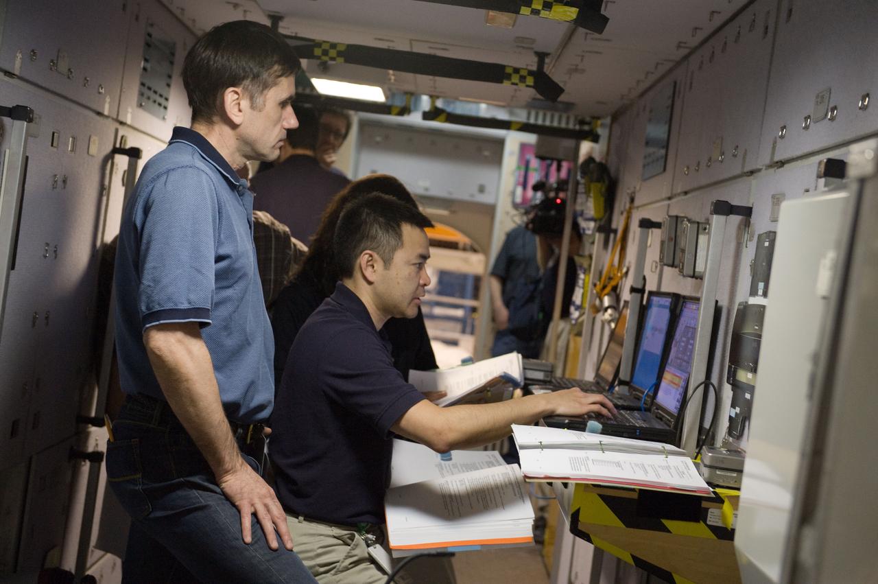 PHOTO DATE:  03/14/12 LOCATION:   B9 ISS MOCKUPS SUBJECT: Expedition 32 (Soyuz 31) crew members Aki Hoshide, Sunita Williams and Yuri Malenchenko during Emergency Scene ASIGND3 training.   PHOTOGRAPHER:GEESEMAN
