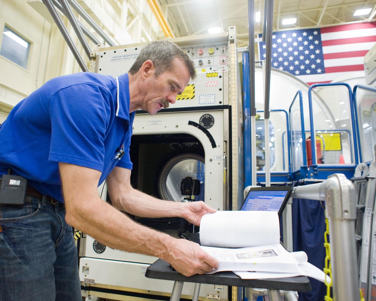 PHOTO DATE:  03-19-12 LOCATION:   Bldg. 9NW - ISS Mockups SUBJECT: Expedition 34/35 crew training PHOTOGRAPHER: BILL STAFFORD