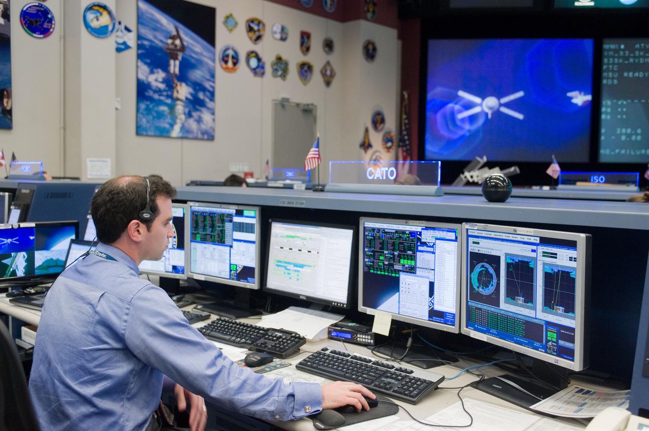 PHOTO DATE:  03-28-12 LOCATION: Bldg. 30 - FCR-1 (30M/231)   SUBJECT: Expedition 30 flight control team during docking of ESA's ATV vehicle to ISS. PHOTOGRAPHER: BILL STAFFORD