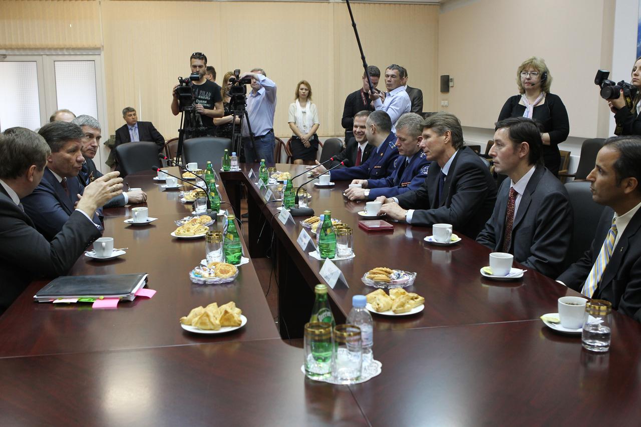 (26 April 2012) -- At the headquarters of the Russian Federal Space Agency, the head of Roscosmos, Vladimir Popovkin (center left), and other Russian space officials spend time with the Expedition 31 prime and backup crew members April 26, 2012 prior to their departure May 2 for their launch site in Baikonur, Kazakhstan. On the right from top to bottom are Expedition 31 backup crewmembers Kevin Ford, Evgeny Tarelkin and Oleg Novitskiy, and prime crewmembers -- Soyuz Commander Gennady Padalka (right center), flight engineer Sergei Revin and NASA Flight Engineer Joe Acaba. Padalka, Revin and Acaba are scheduled to launch to the International Space Station May 15 in their Soyuz TMA-04M spacecraft. Photo credit: NASA