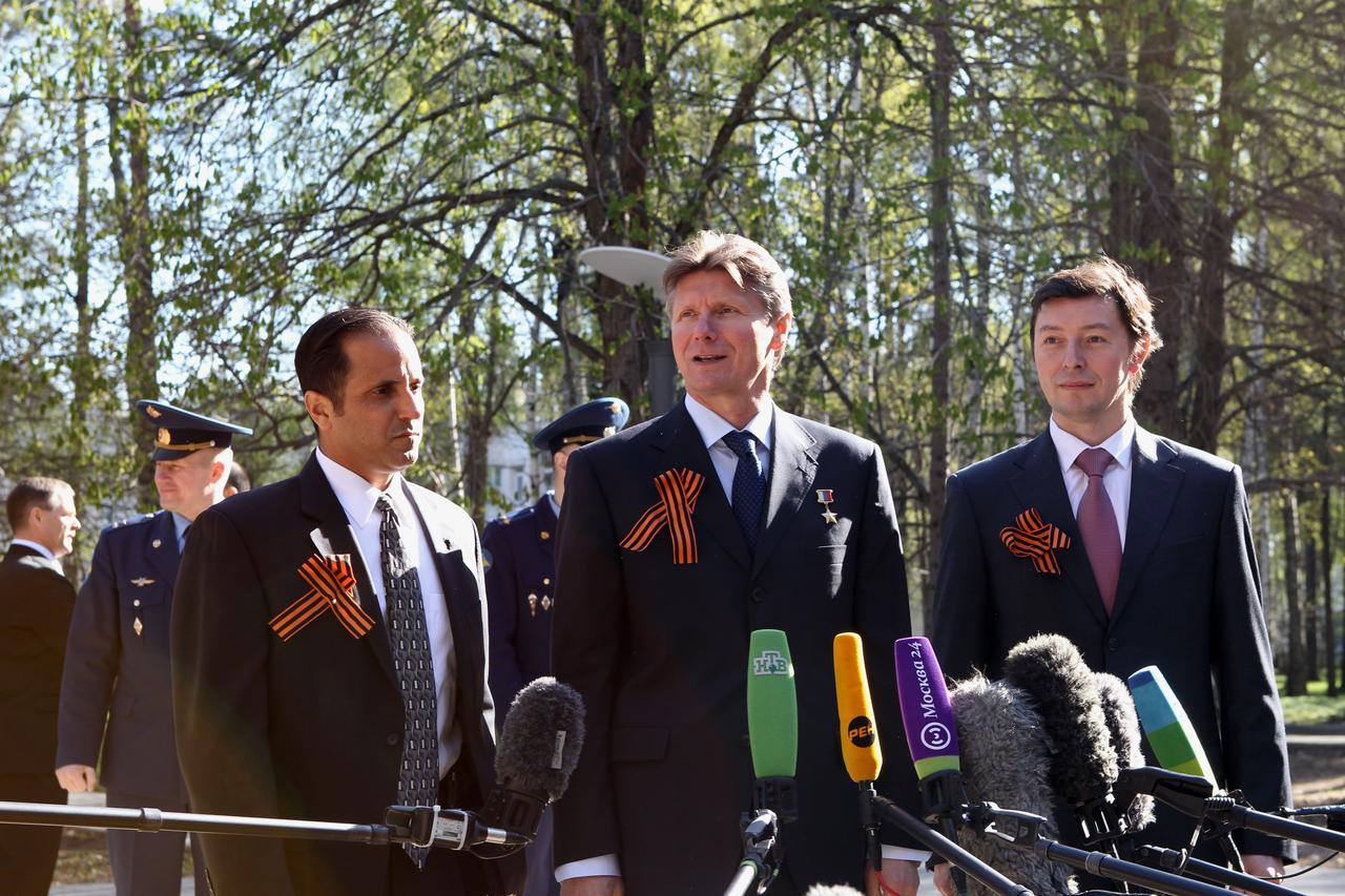 (2 May, 2012) --- At the Gagarin Cosmonaut Training Center at Star City, Russia on May 2, 2012, the prime crew members who will round out Expedition 31 on the International Space Station answer questions from reporters during their farewell sendoff to the Baikonur Cosmodrome in Kazakhstan. From left to right  are NASA Flight Engineer Joe Acaba, Soyuz Commander Gennady Padalka, and Flight Engineer Sergei Revin,  -- all three wearing the orange Ribbon of St. George in honor of Russia’s Victory Day celebrations on May 9. The trio are scheduled to launch to the space station on May 15 in their Soyuz TMA-04M spacecraft.  NASA/Stephanie Stoll 