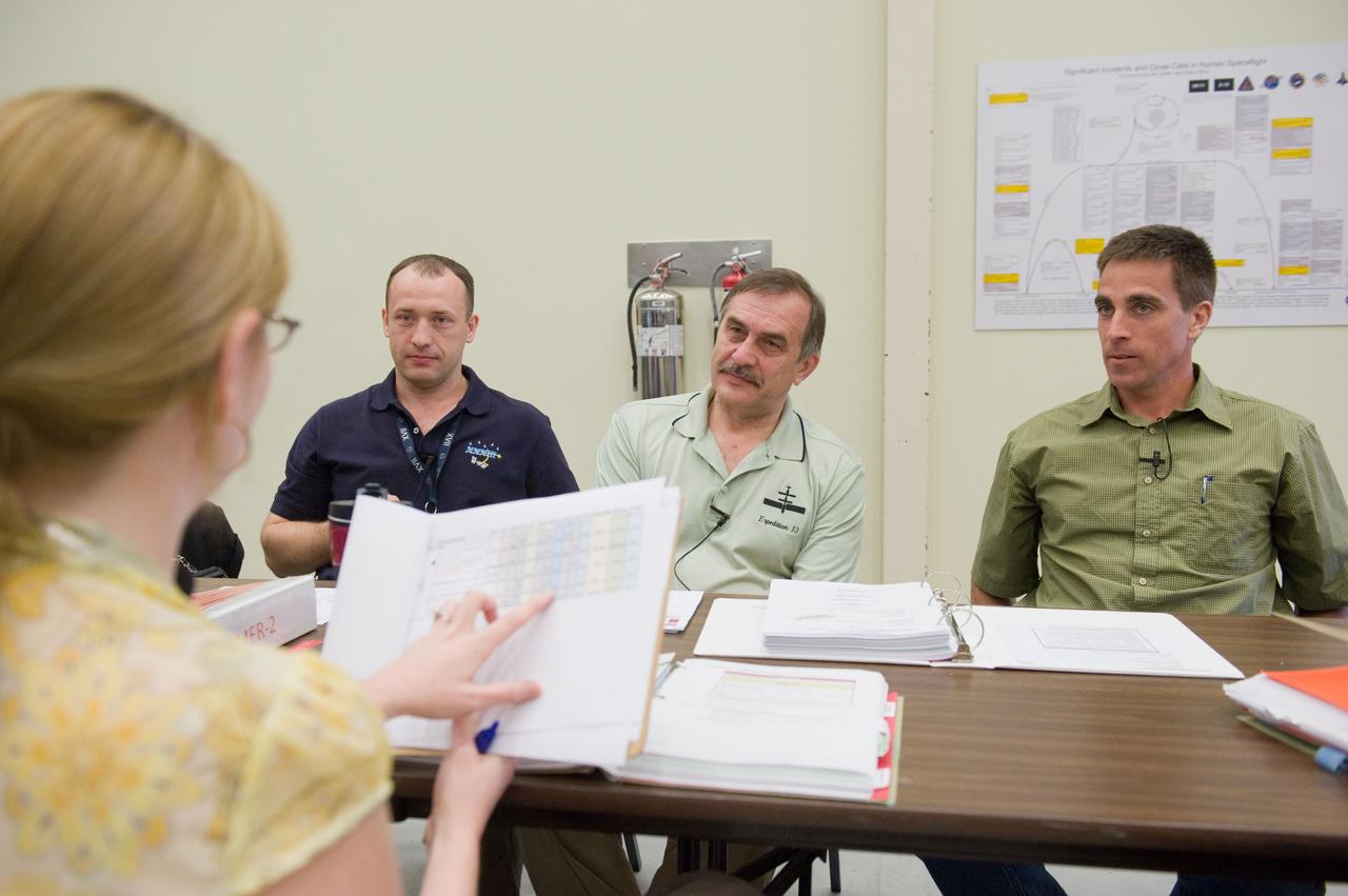 DATE: 5-8-12 LOCATION: Bldg. NW - ISS Mockups SUBJECT: Expedition 35/36 crew training (Pavel Vinogradov, Alexander Misurkin and Chris Cassidy) during emergency scenarios training in the ISS mockups with Station Training Lead, Lucia McCullough. PHOTOGRAPHER: Lauren Harnett 