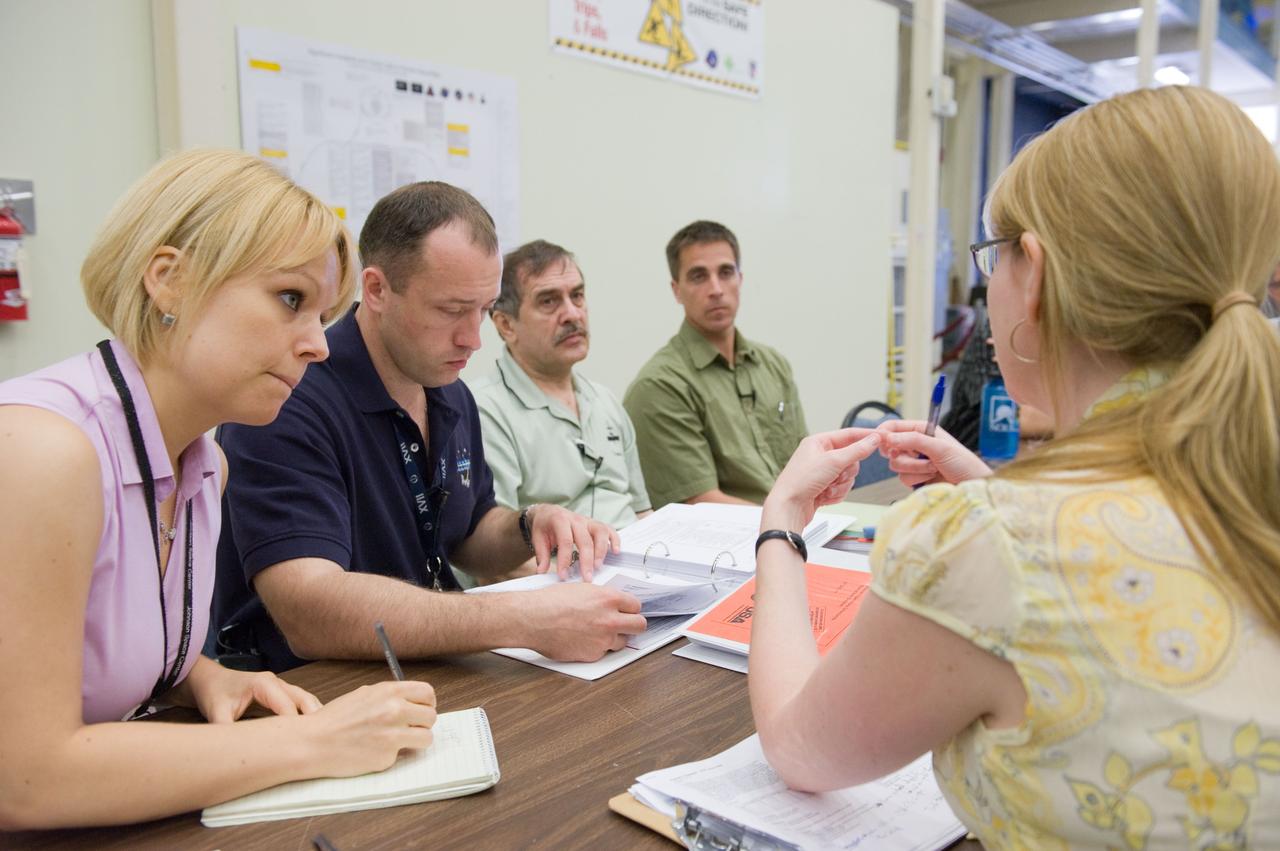 DATE: 5-8-12 LOCATION: Bldg. NW - ISS Mockups SUBJECT: Expedition 35/36 crew training (Pavel Vinogradov, Alexander Misurkin and Chris Cassidy) during emergency scenarios training in the ISS mockups with Station Training Lead, Lucia McCullough. PHOTOGRAPHER: Lauren Harnett 