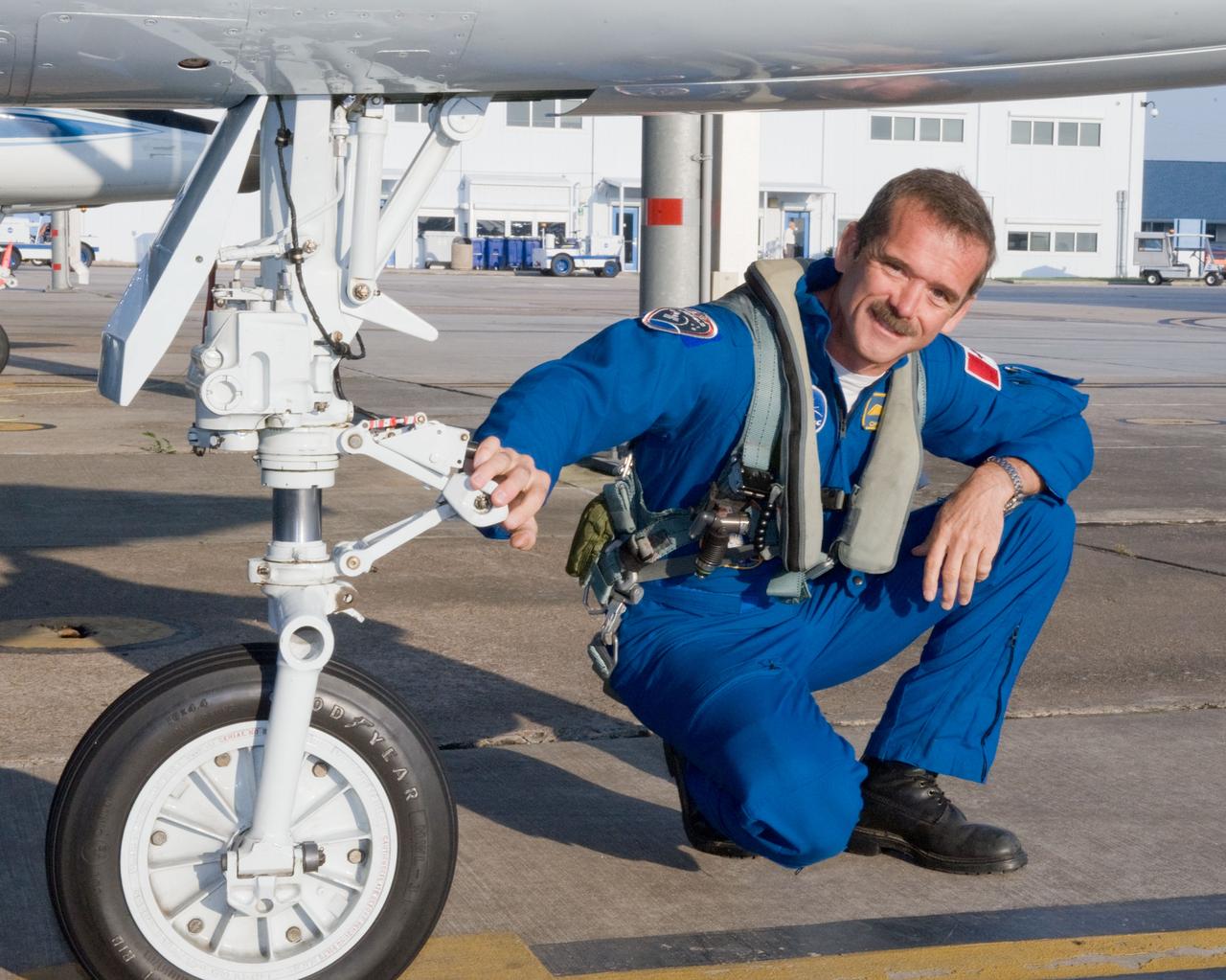 Expedition 35 (Soyuz 33S) crew member Chris Hadfield preparing for a T-38 flight.  Photo Date: May 14, 2012.  Location: Ellington Field - Hangar 276 - Tarmac.  Photographer: Robert Markowitz