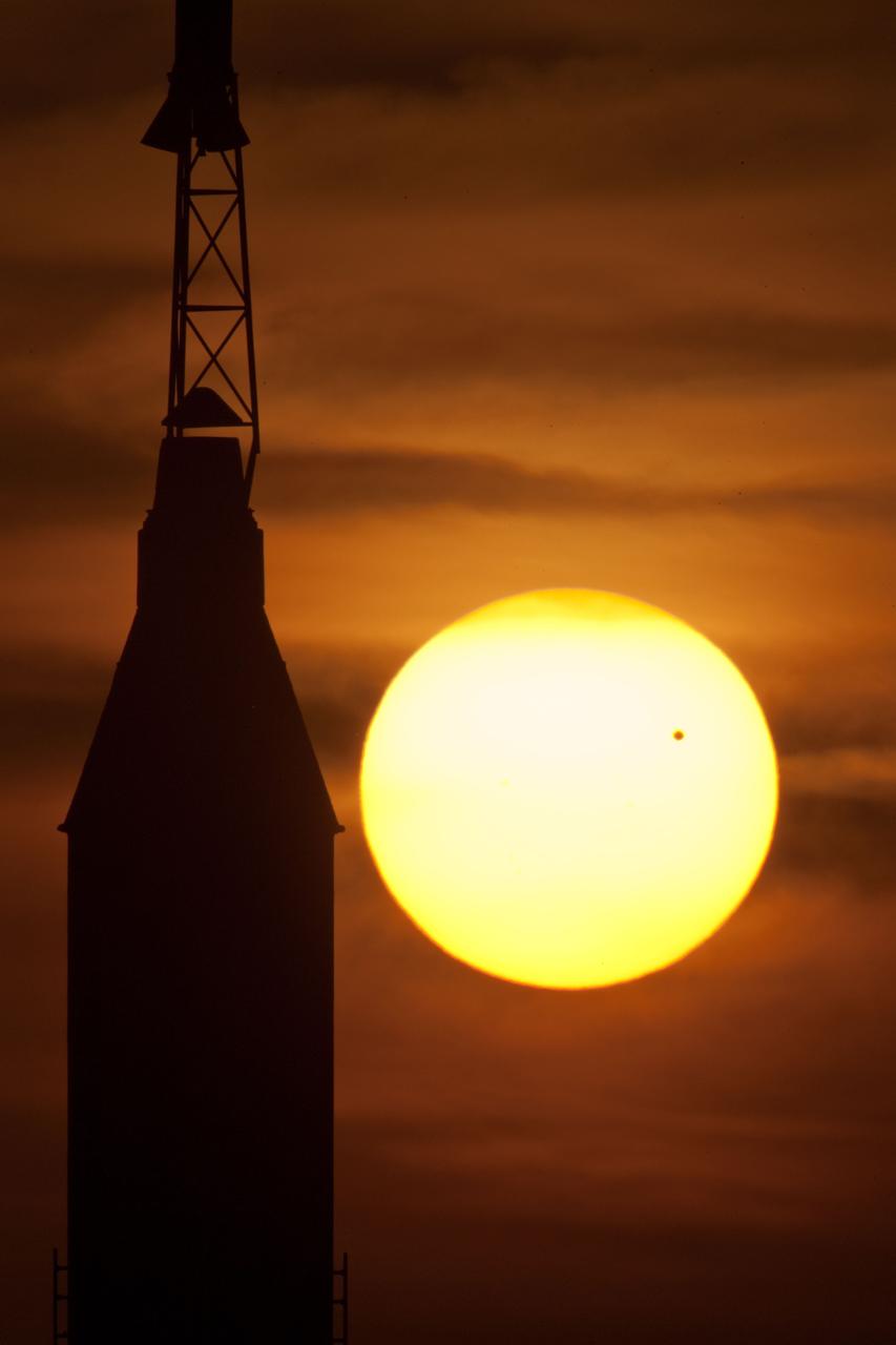 JSC2012-E-063490 (5 June 2012) --- The June 5, 2012 transit of Venus, the small dot to the right of center, was captured by a Johnson Space Center photographer in Rocket Park. A Mercury-Redstone vehicle on display in the park is seen at left.  Photo credit: NASA