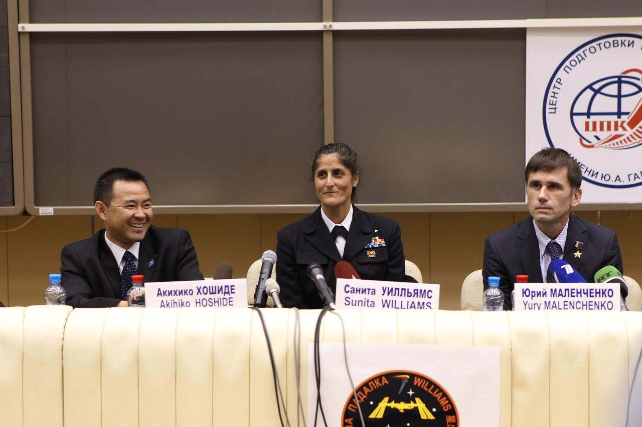At the Gagarin Cosmonaut Training Center in Star City, Russia, Expedition 32/33 Flight Engineer Aki Hoshide of the Japan Aerospace Exploration Agency (left), NASA Flight Engineer Sunita Williams (center) and Soyuz Commander Yuri Malenchenko answered questions during a pre-launch news conference June 22, 2012. The crew will travel to the Baikonur Cosmodrome in Kazakhstan July 2 for final preparations leading to their launch July 15 to the International Space Station in their Soyuz TMA-05M spacecraft.  Credit: NASA/Stephanie Stoll 