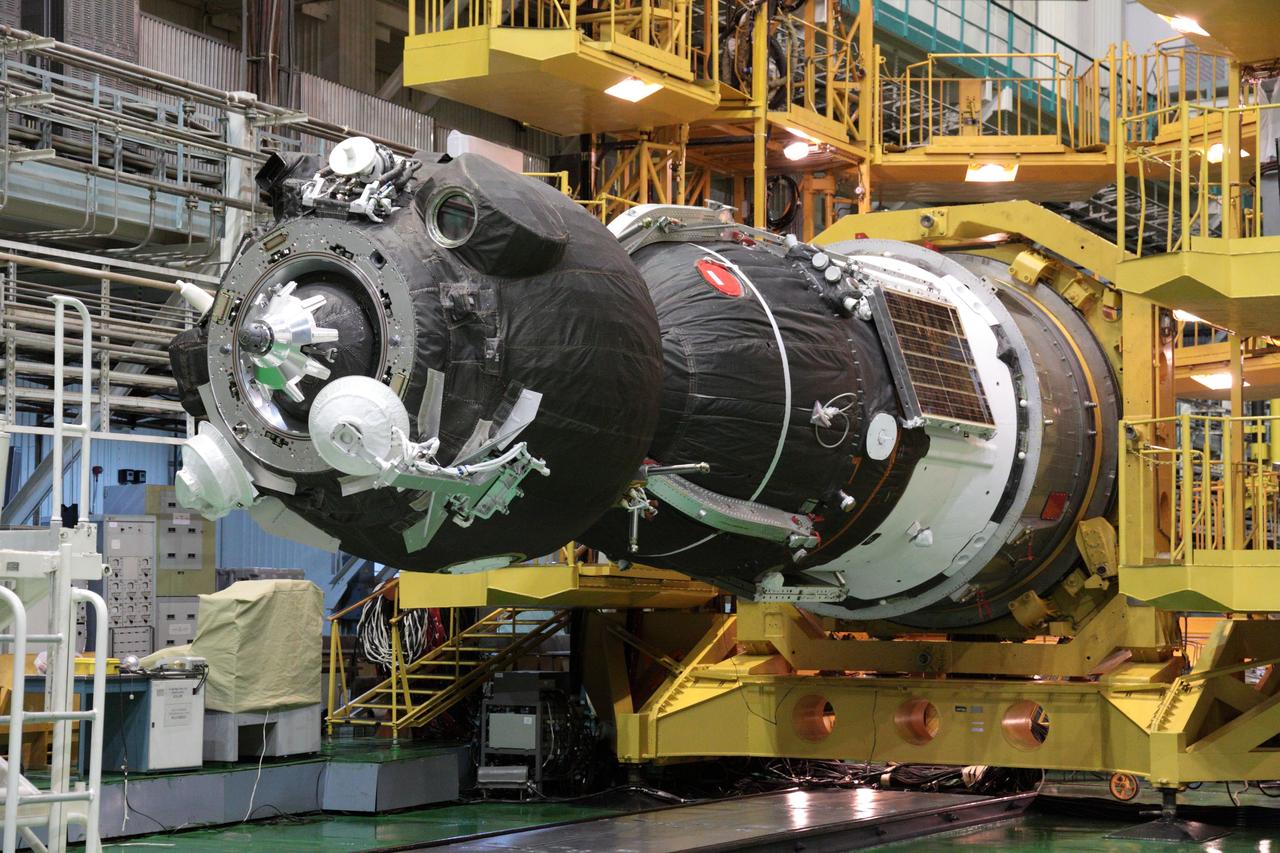 At the Baikonur Cosmodrome in Kazakhstan, the Soyuz TMA-05M spacecraft is readied for its encapsulation into the upper stage of its Soyuz booster July 8, 2012 in advance of its rollout to the launch pad July 12 and the launch of its occupants, Expedition 32/33 Soyuz Commander Yuri Malenchenko, NASA Flight Engineer Sunita Williams and Flight Engineer Aki Hoshide of the Japan Aerospace Exploration Agency July 15 for a four-month mission on the International Space Station.  NASA/Victor Zelentsov 