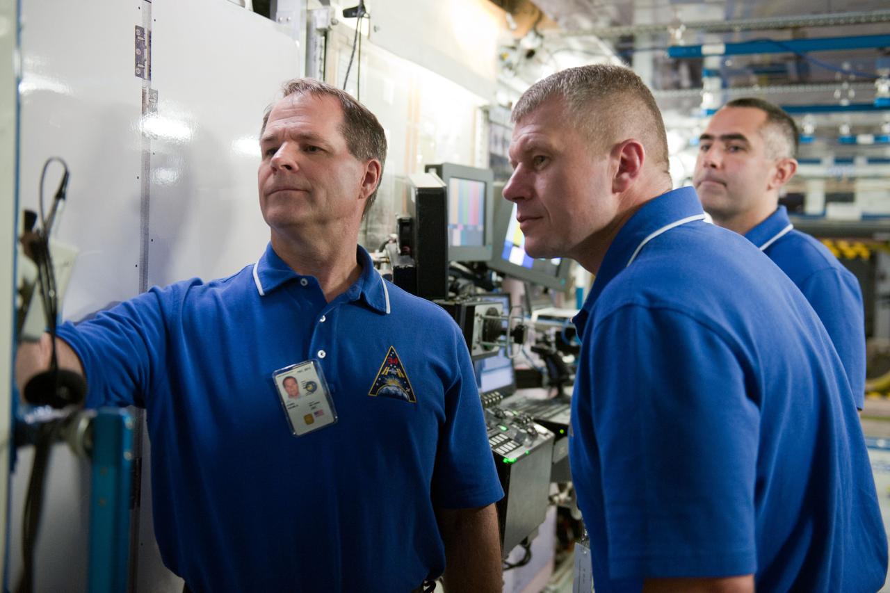 PHOTO DATE: 7-20-12 LOCATION: Bldg. 9NW - ISS Mockups SUBJECT: Expedition 34 (Soyuz 32) crew (Ford, Tarelkin and Notivskiy) during routine ops training in the ISS mockups PHOTOGRAPHER: Lauren Harnett