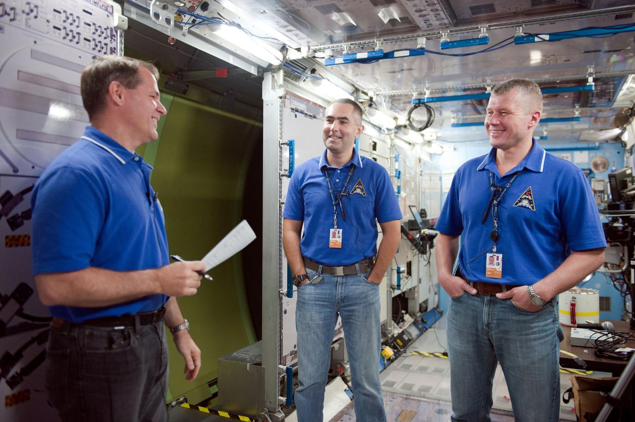 PHOTO DATE: 7-20-12 LOCATION: Bldg. 9NW - ISS Mockups SUBJECT: Expedition 34 (Soyuz 32) crew (Ford, Tarelkin and Notivskiy) during routine ops training in the ISS mockups PHOTOGRAPHER: Lauren Harnett
