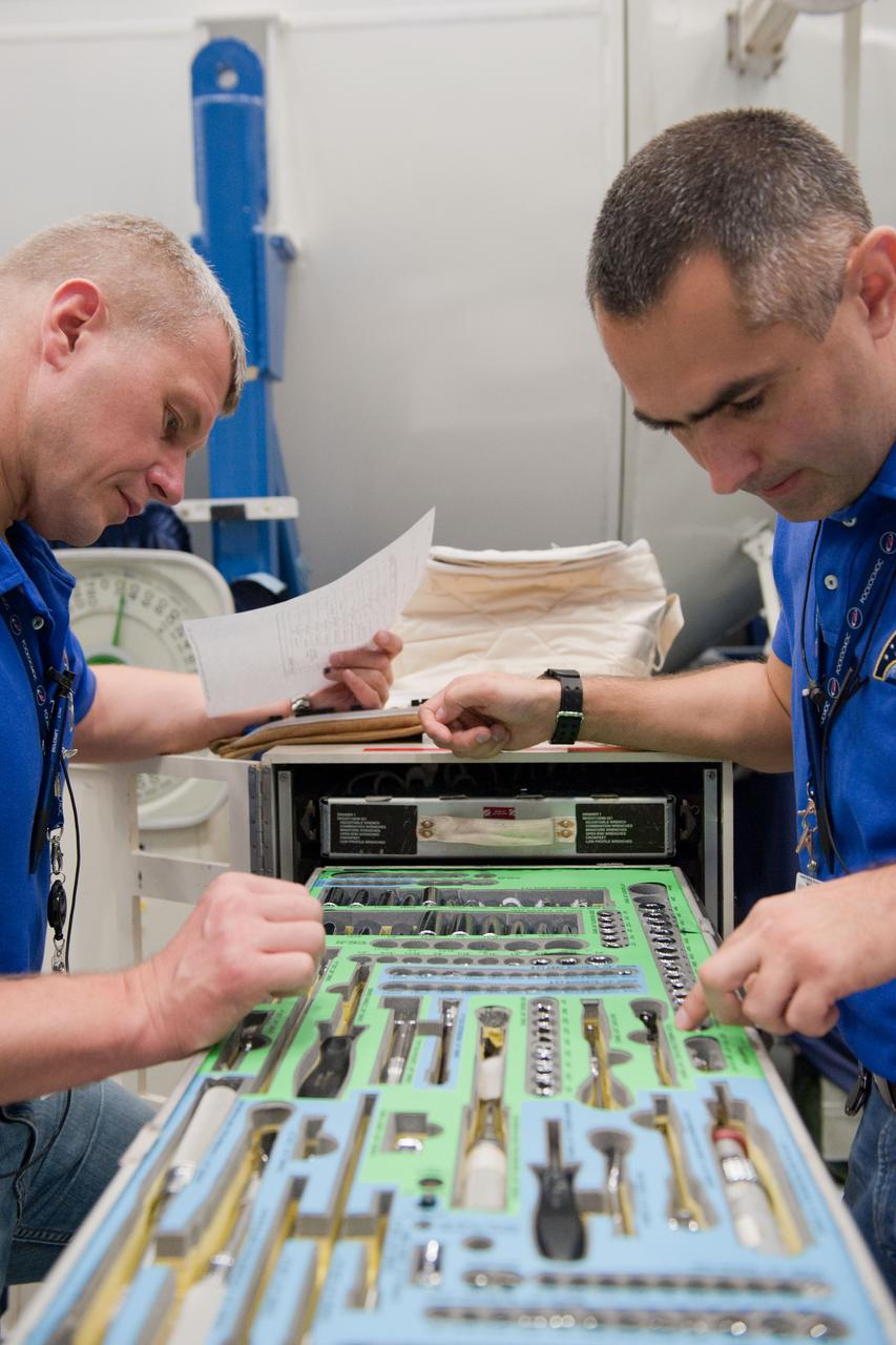 PHOTO DATE: 7-20-12 LOCATION: Bldg. 9NW - ISS Mockups SUBJECT: Expedition 34 (Soyuz 32) crew (Ford, Tarelkin and Notivskiy) during routine ops training in the ISS mockups PHOTOGRAPHER: Lauren Harnett