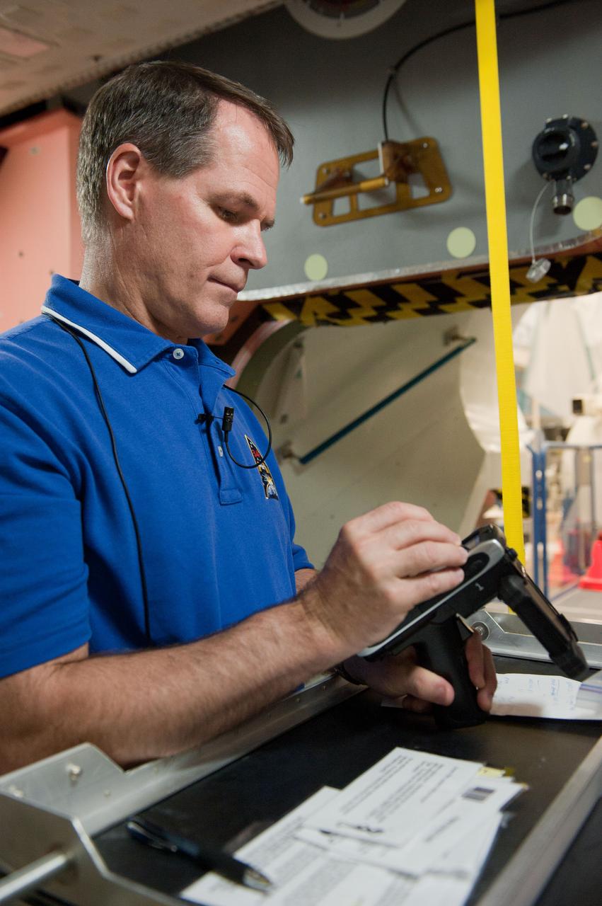 PHOTO DATE: 7-20-12 LOCATION: Bldg. 9NW - ISS Mockups SUBJECT: Expedition 34 (Soyuz 32) crew (Ford, Tarelkin and Notivskiy) during routine ops training in the ISS mockups PHOTOGRAPHER: Lauren Harnett