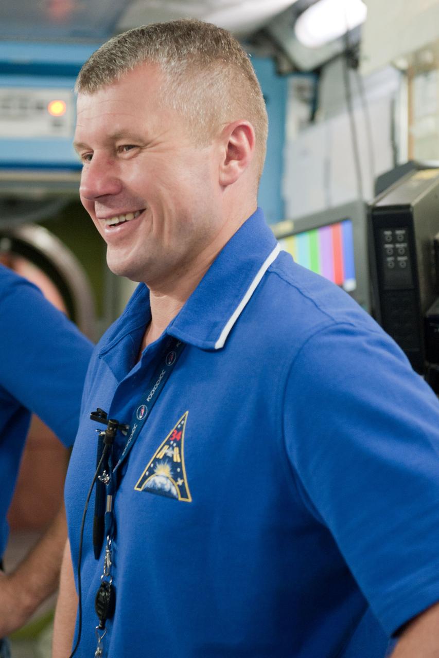 PHOTO DATE: 7-20-12 LOCATION: Bldg. 9NW - ISS Mockups SUBJECT: Expedition 34 (Soyuz 32) crew (Ford, Tarelkin and Notivskiy) during routine ops training in the ISS mockups PHOTOGRAPHER: Lauren Harnett