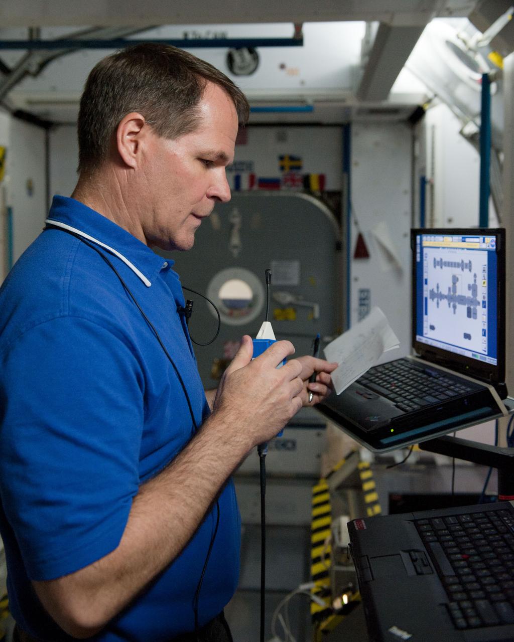 PHOTO DATE: 7-20-12 LOCATION: Bldg. 9NW - ISS Mockups SUBJECT: Expedition 34 (Soyuz 32) crew (Ford, Tarelkin and Notivskiy) during routine ops training in the ISS mockups PHOTOGRAPHER: Lauren Harnett