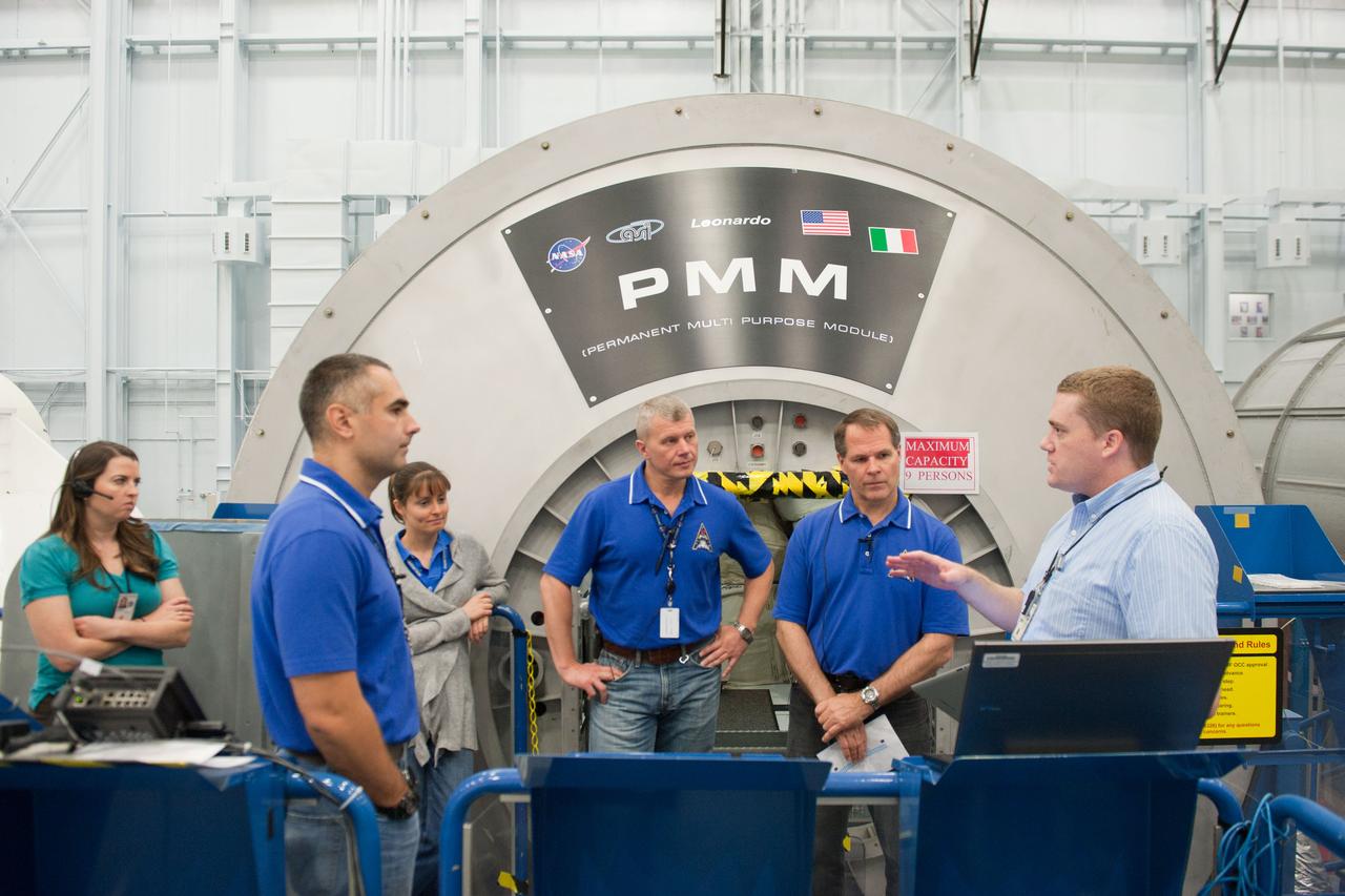 PHOTO DATE: 7-20-12 LOCATION: Bldg. 9NW - ISS Mockups SUBJECT: Expedition 34 (Soyuz 32) crew (Ford, Tarelkin and Notivskiy) during routine ops training in the ISS mockups PHOTOGRAPHER: Lauren Harnett