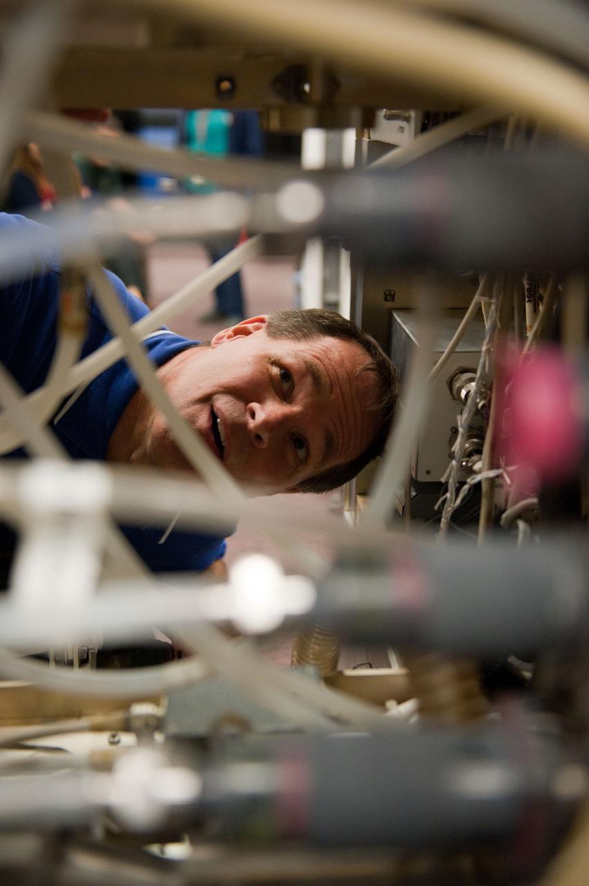 PHOTO DATE: 7-20-12 LOCATION: Bldg. 9NW - ISS Mockups SUBJECT: Expedition 34 (Soyuz 32) crew (Ford, Tarelkin and Notivskiy) during routine ops training in the ISS mockups PHOTOGRAPHER: Lauren Harnett