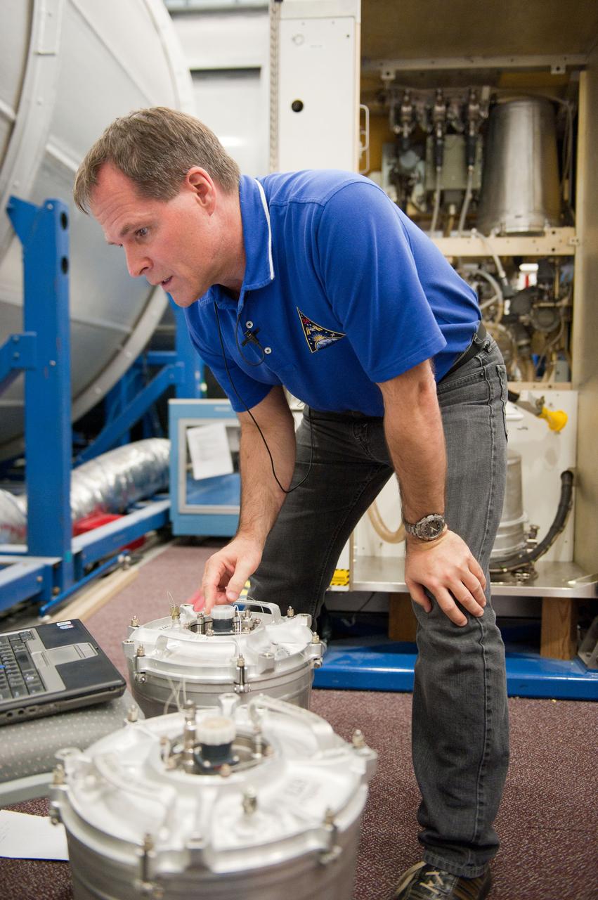 PHOTO DATE: 7-20-12 LOCATION: Bldg. 9NW - ISS Mockups SUBJECT: Expedition 34 (Soyuz 32) crew (Ford, Tarelkin and Notivskiy) during routine ops training in the ISS mockups PHOTOGRAPHER: Lauren Harnett