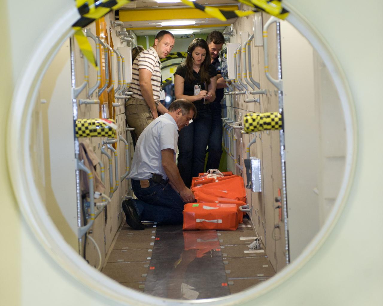 Emergency Scenarios training for the joint Soyuz 33 and Soyuz 34 crew training (Expedition 35).  Photo Date: August 2, 2012.  Location: Bldg. 9NW - ISS Mockups.  Photographer: Robert Markowitz
