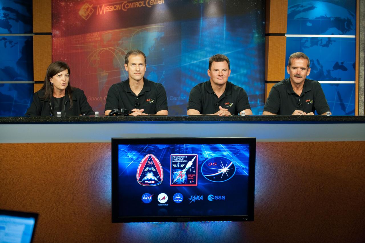 PHOTO DATE: 13 September 2012 LOCATION: BLdg. 2 North - Press Conference Room SUBJECT: Expedition 34/35 Press Conference. Expedition 34 and 35 crew members Thomas Marshburn of NASA, Chris Hadfield of the Canadian Space Agency and Roman Romanenko of the Russian Federal Space Agency participate with PAO moderator Nicole Cloutier-LeMasters PHOTOGRAPHER: Mark Sowa