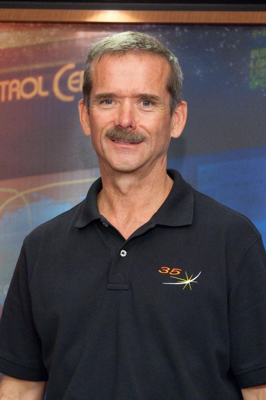 PHOTO DATE: 13 September 2012 LOCATION: BLdg. 2 North - Press Conference Room SUBJECT: Expedition 34/35 Press Conference. Expedition 34 and 35 crew members Thomas Marshburn of NASA, Chris Hadfield of the Canadian Space Agency and Roman Romanenko of the Russian Federal Space Agency participate with PAO moderator Nicole Cloutier-LeMasters PHOTOGRAPHER: Mark Sowa