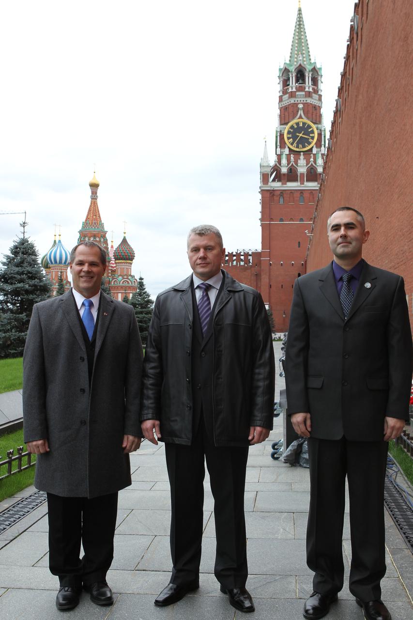 With St. Basil’s Cathedral providing a scenic backdrop, Expedition 33/34 Flight Engineer Kevin Ford of NASA (left), Soyuz Commander Oleg Novitskiy (center) and Flight Engineer Evgeny Tarelkin (right) pose for pictures September 25, 2012 at the Kremlin Wall in Moscow as they participated in traditional ceremonies leading to their launch to the International Space Station October 23 in the Soyuz TMA-06M spacecraft from the Baikonur Cosmodrome in Kazakhstan for a five-month mission. NASA/Stephanie Stoll