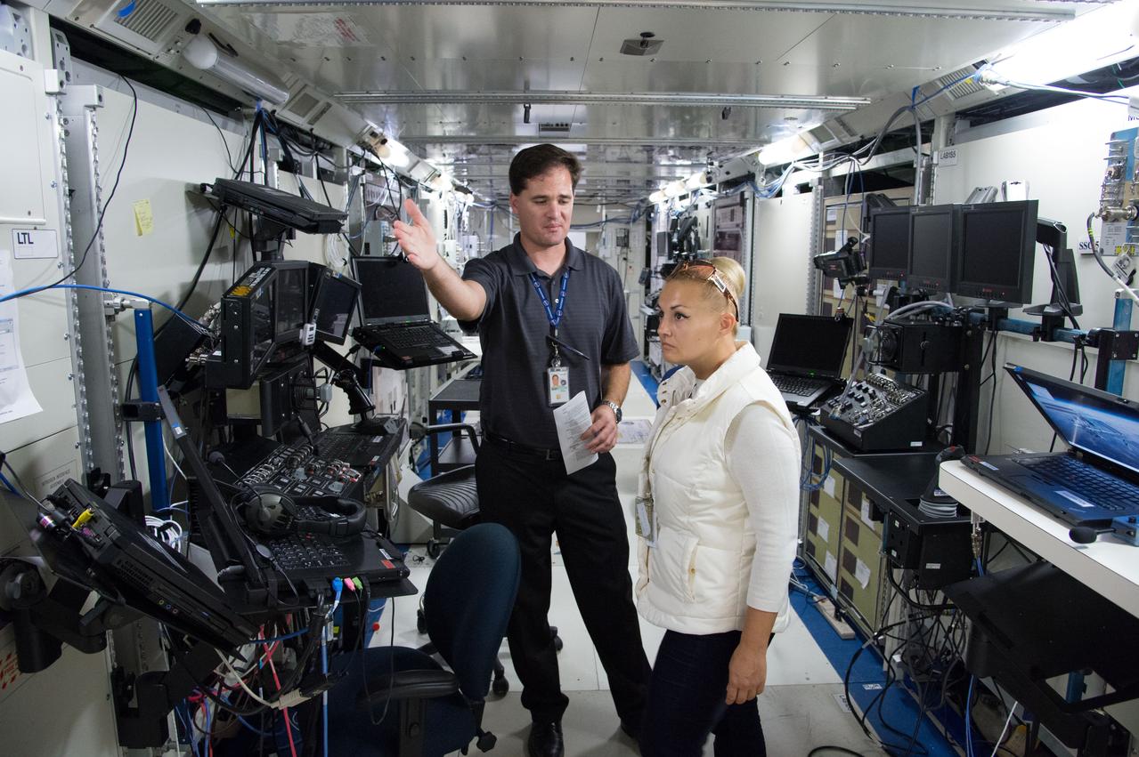 Date:11-08-12 Location: Bldg 5 South, SSMTF Subject: Expedition 41/42 (Soyuz 40) Russian cosmonaut Yelena (Elena) Serova during Space Station Training Facility (SSTF) Familiarization with instructor Josh Matthew Photographer: James Blair