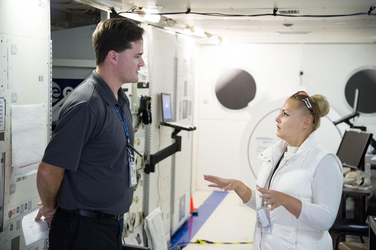 Date:11-08-12 Location: Bldg 5 South, SSMTF Subject: Expedition 41/42 (Soyuz 40) Russian cosmonaut Yelena (Elena) Serova during Space Station Training Facility (SSTF) Familiarization with instructor Josh Matthew Photographer: James Blair