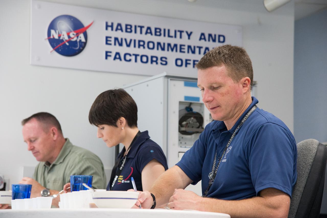 PHOTO DATE:  11-08-12 LOCATION:  Bldg. 17, Rm 1070 - Food Lab   SUBJECT:  Expedition 41/42 crew members Barry Wilmore, Terry Virts and Italian ESA astronaut Samantha Cristoforetti during their food tasting in Bldg. 17. PHOTOGRAPHER:  BILL STAFFORD