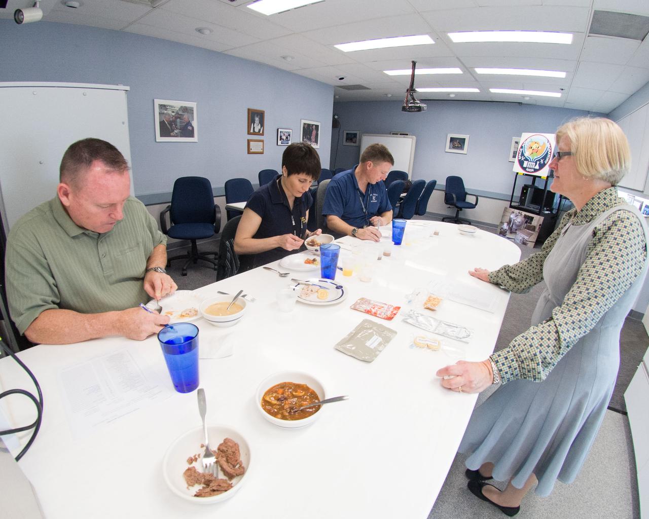 PHOTO DATE:  11-08-12 LOCATION:  Bldg. 17, Rm 1070 - Food Lab   SUBJECT:  Expedition 41/42 crew members Barry Wilmore, Terry Virts and Italian ESA astronaut Samantha Cristoforetti during their food tasting in Bldg. 17. PHOTOGRAPHER:  BILL STAFFORD