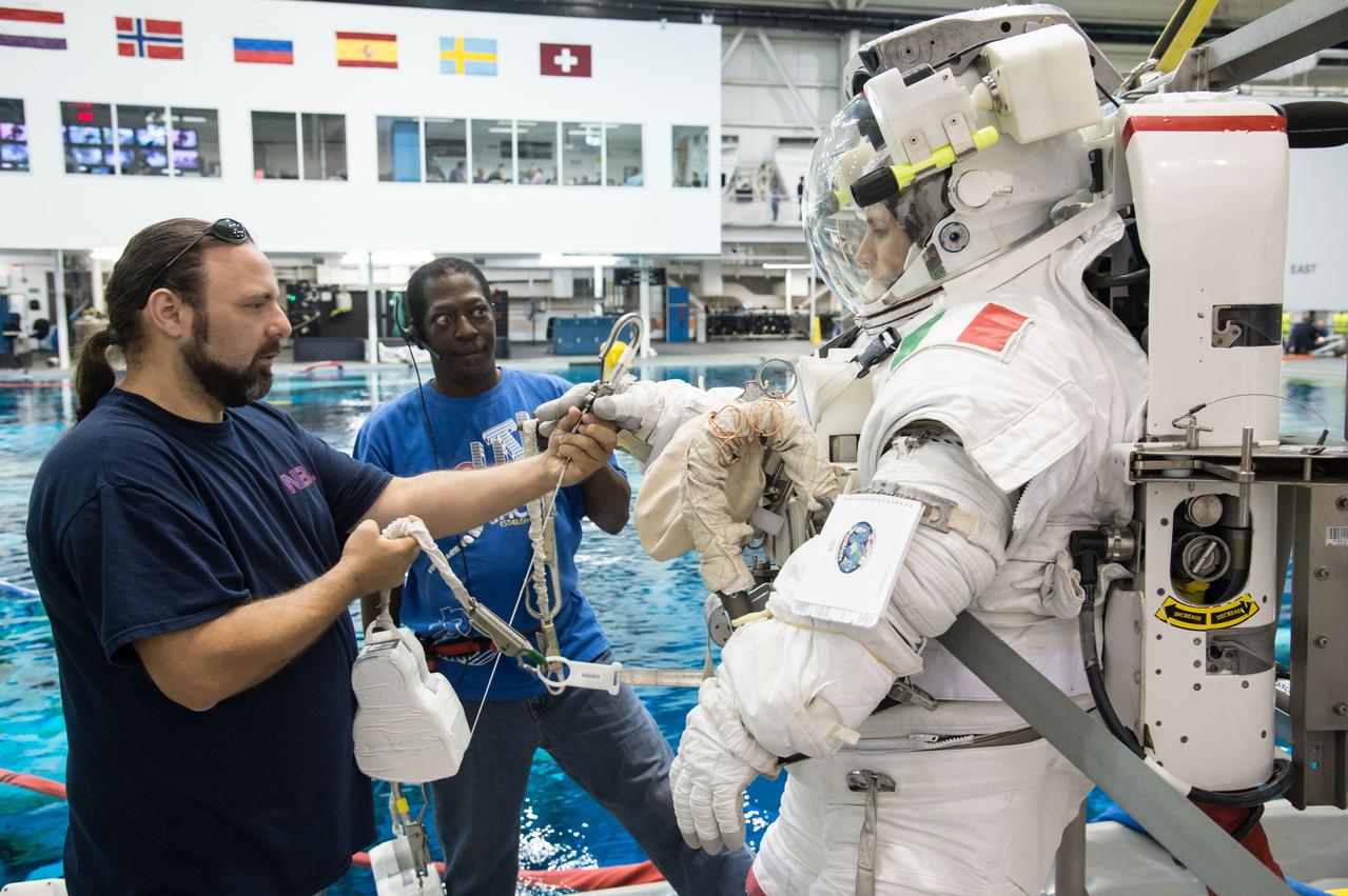 PHOTO DATE:  11-21-12 LOCATION: NBL - Pool Topside   SUBJECT: Expedition 42/43 crew member and Italian ESA astronaut Samantha Cristoforetti with NASA astronaut Terry Virts during INC-42/CB EVA SKILLS 21027. PHOTOGRAPHER: BILL STAFFORD