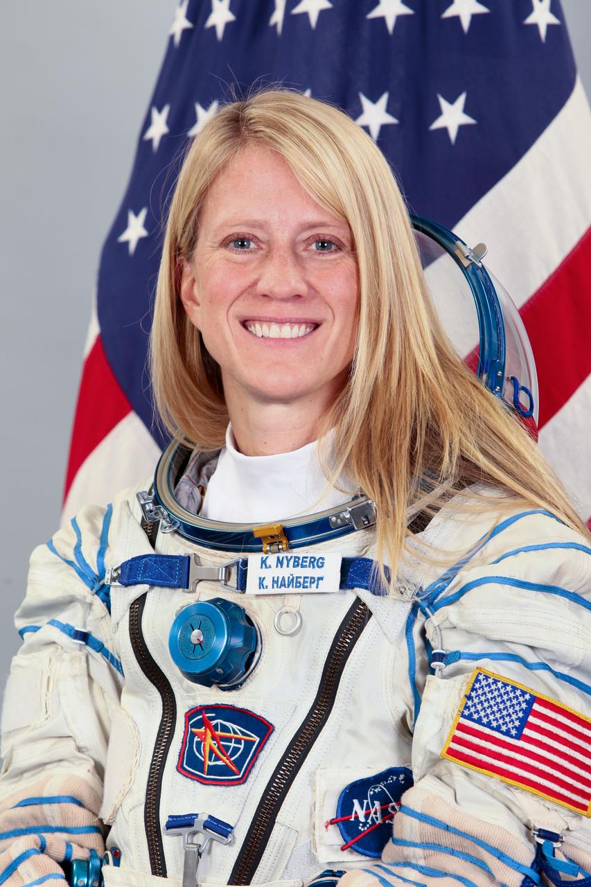 JSC2012-E-238484 (27 Aug. 2012) --- NASA astronaut Karen Nyberg, Expedition 34 backup crew member, attired in a Russian Sokol launch and entry suit, takes a break from training in Star City, Russia to pose for a portrait. Photo credit: Gagarin Cosmonaut Training Center