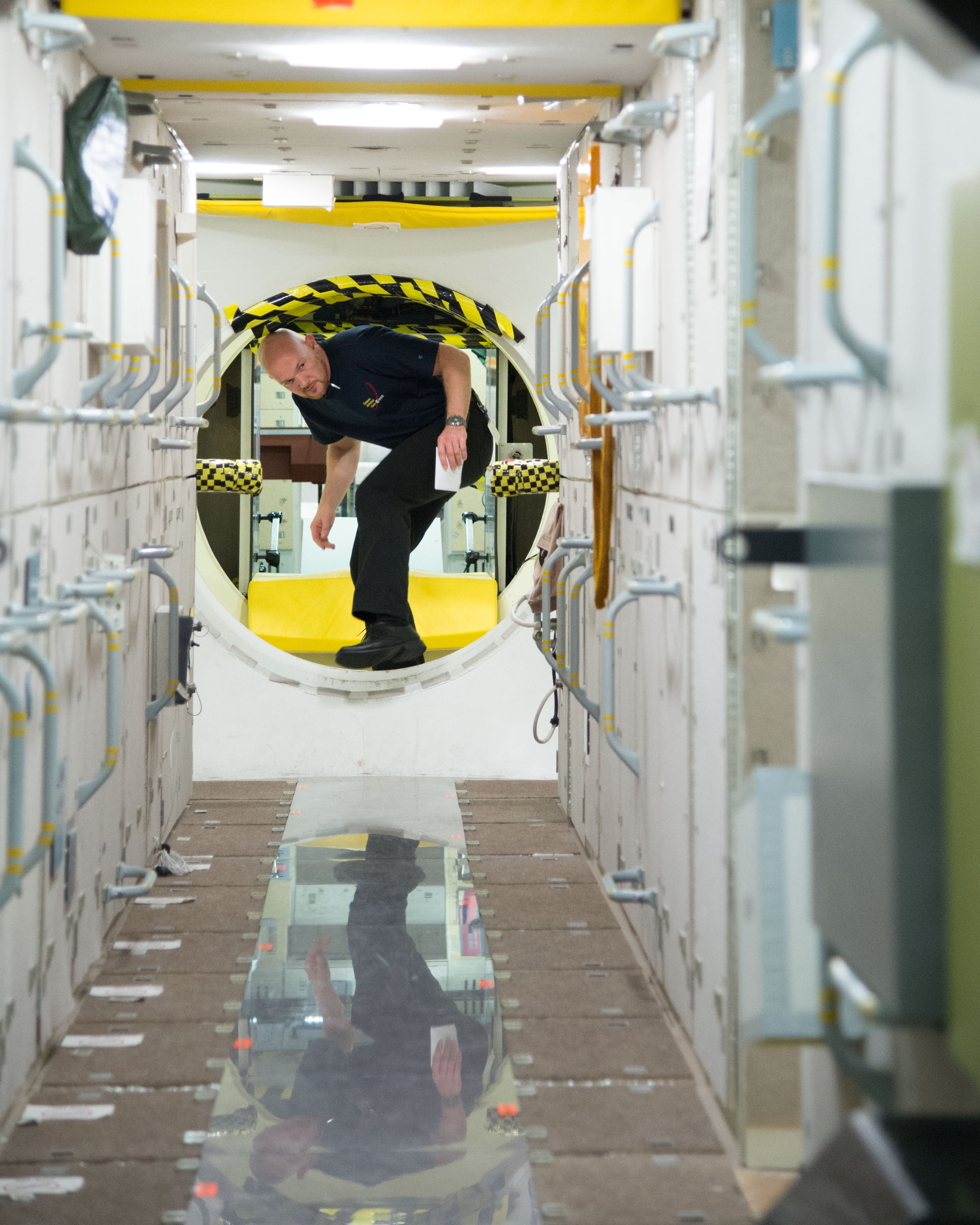 PHOTO DATE: 11-27-12 LOCATION: Bldg. 9NW - ISS Mockups SUBJECT: Expedition 40 crew members (Soyuz 39) Reid Wiseman and ESA astronaut Alexander Gerst with Soyuz 38 crew member Steve Swanson during ROUTINE OPS MS 1 PHOTOGRAPHER: BILL STAFFORD