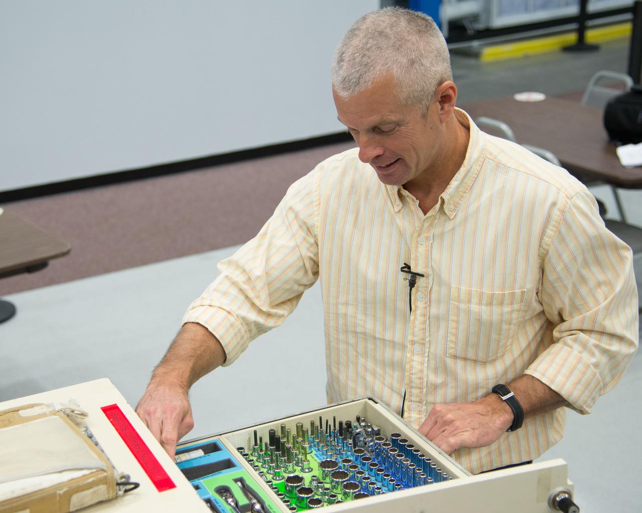 PHOTO DATE: 11-27-12 LOCATION: Bldg. 9NW - ISS Mockups SUBJECT: Expedition 40 crew members (Soyuz 39) Reid Wiseman and ESA astronaut Alexander Gerst with Soyuz 38 crew member Steve Swanson during ROUTINE OPS MS 1 PHOTOGRAPHER: BILL STAFFORD