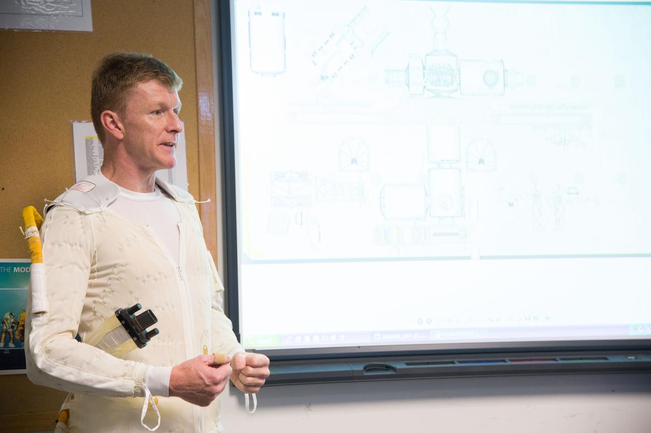 ESA astronaut and first astronaut from the United Kingdom, Timothy Peake, with NASA astronaut Scott Tingle (unassigned) during EVA Skills training in the NBL.  Photo Date: November 27, 2012.  Location: NBL - Pool Topside.  Photographer: Robert Markowitz